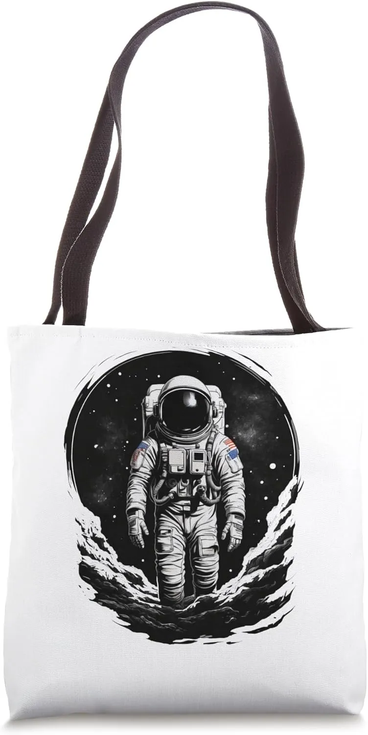 Solitary Astronaut Floating in Inky Space - Graphic Shirt Tote Bag
